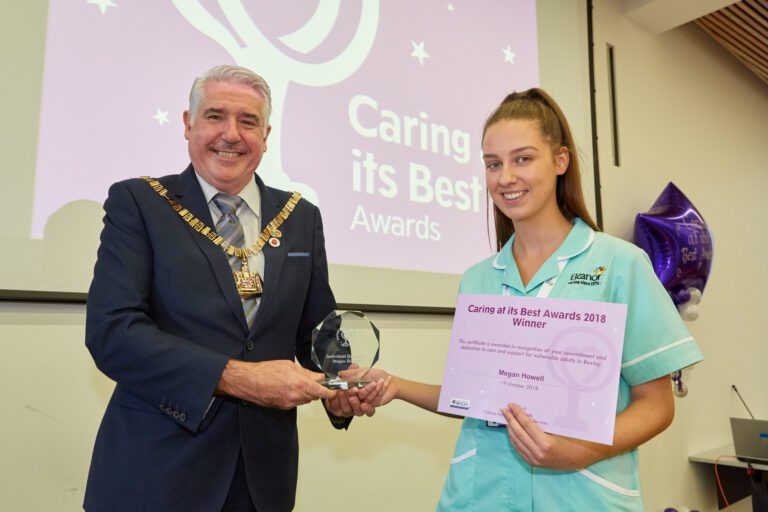 Careworker at Eleanor Healthcare Group's Bexley Office Receiving Award from the Mayor
