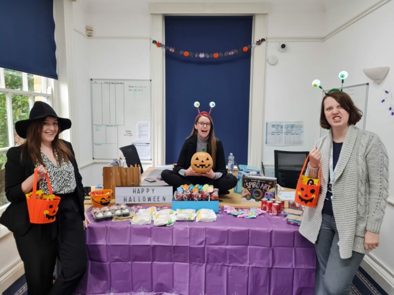 Employees enjoying a Halloween party at Eleanor Healthcare Group's Portsmouth Home Care Office