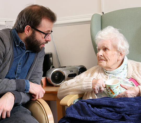 Hartley House Care Home Resident with Their Loved Ones: Quality Time Together