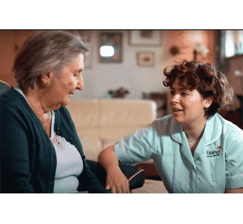 Eleanor Healthcare Group Care worker taking care of resident