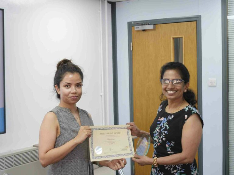 Eleanor Healthcare Group Employee receiving award and recognistion